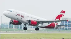  ?? TYLER ANDERSON/FILES ?? Air Canada says its amended labour deal with its 3,500 pilots will allow its low-cost leisure carrier Rouge to serve more markets and offer flexibilit­y in order to compete with ultra-low cost carriers.