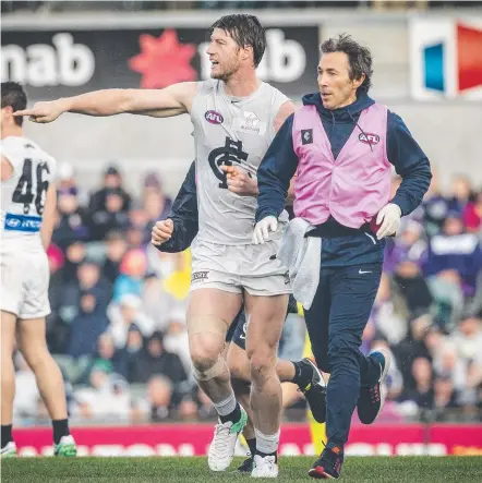  ??  ?? Carlton big man Sam Rowe leaves the field during his side’s loss to Fremantle yesterday. Picture: AAP IMAGE