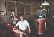  ?? BEA AHBECK/NEWS-SENTINEL ?? Java Stop owner Kelly Brown relaxes at the Lodi coffee house on Sept. 18.