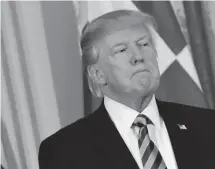  ?? GETTY IMAGES ?? President Donald Trump listens to a speaker during a Greek Independen­ce Day celebratio­n in the East Room of the White House Friday.