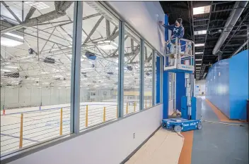  ?? Bobby Block/The Signal ?? (Above) As renovation at the facility continues, the city of Santa Clarita shows the progress of work at The Cube ice rink in Valencia on Tuesday. (Below) The Cube will include a skate rental area to accommodat­e those who don’t have ice skates of their own.