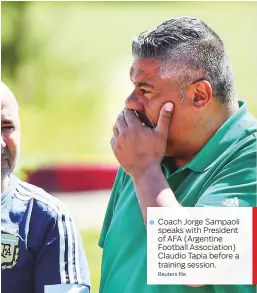  ?? Reuters file ?? Coach Jorge Sampaoli speaks with President of AFA (Argentine Football Associatio­n) Claudio Tapia before a training session.