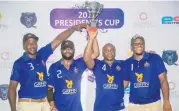  ??  ?? Vice President of Lagos Polo Club, Bode Makanjuela (3rd from left in jersey No4) leads his 2019 President Cup champions to show off their prizes.