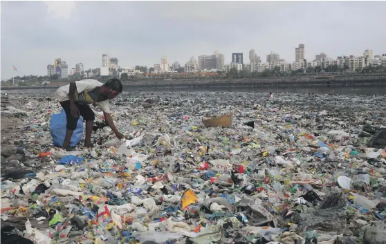  ?? AP ?? The shores of Mumbai littered with plastic and other garbage. The theme for this year’s World Environmen­t Day hosted by India was ‘Beat Plastic Pollution’