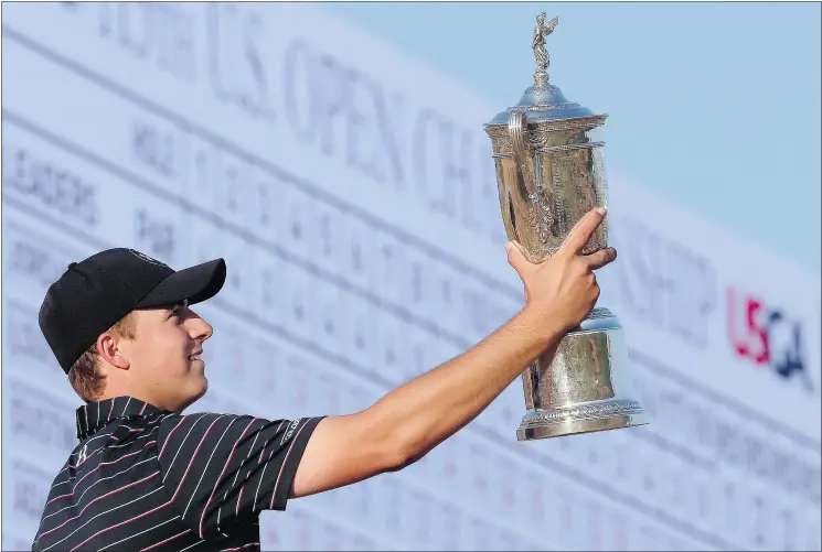  ?? — THE ASSOCIATED PRESS FILES ?? Jordan Spieth, 21, poses with the trophy after winning the U.S. Open golf tournament at Chambers Bay in University Place on Sunday.