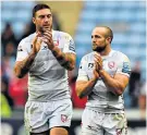  ??  ?? Big hands: Charlie Sharples (right) and Matt Banahan clap the Gloucester fans