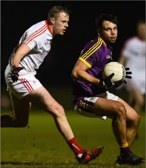  ??  ?? Newcomer Conor Devitt taking on Jim McEneaney of Louth.
