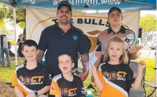  ??  ?? RIGHT: Charters Towers Bulls Modified Rugby Program coordinato­r Kelvin Peno with some of the participan­ts and supporters of the program in Charters Towers.