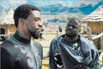  ??  ?? T’challa/black Panther (Chadwick Boseman), left, and W’kabi (Daniel Kaluuya) in a scene from “Black Panther.” Marvel Studios