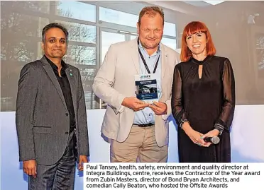  ?? ?? Paul Tansey, health, safety, environmen­t and quality director at Integra Buildings, centre, receives the Contractor of the Year award from Zubin Masters, director of Bond Bryan Architects, and comedian Cally Beaton, who hosted the Offsite Awards