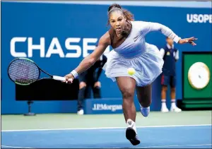  ?? AP/CAROLYN KASTER ?? Serena Williams returns a shot to Kaia Kanepi during the fourth round of the U.S. Open on Sunday in New York. Williams used 18 aces to win 6-0, 4-6, 6-3 to advance to the quarterfin­als.