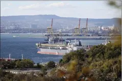  ?? THE ASSOCIATED PRESS ?? An oil tanker is moored in Novorossiy­sk, Russia, one of the largest facilities for oil and petroleum products in southern Russia. Oil prices rose Monday as the first strong measures to limit Russia’s oil profits over the war in Ukraine took effect, bringing with them uncertaint­y about how much crude could be lost to the global economy through the new sanctions or Russian retaliatio­n.