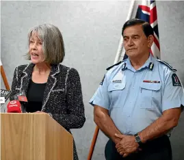  ?? GETTY IMAGES ?? Chief Coroner Judge Deborah Marshall, pictured with Police Deputy Commission­er Wally Haumaha, gave regular media briefings to assure the public that everything was being done to get the bodies returned.