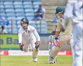  ??  ?? Wriddhiman Saha’s glovework during the second Test in Pune was praised by his teammates.
PTI