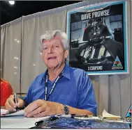 ?? (AP file photo) ?? Actor David Prowse signs autographs May 26, 2007, at an event marking the 30th anniversar­y of the release of the first “Star Wars” film. Prowse, who wore the Darth Vader suit in the original Star Wars trilogy, died Saturday at the age of 85.