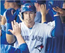  ?? FRED THORNHILL/THE CANADIAN PRESS ?? Blue Jays first baseman Justin Smoak says he “chased the numbers” in previous seasons, and now that he is swinging more naturally, those power numbers are finally showing up.