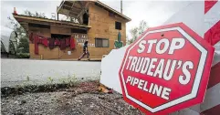  ?? DARRYL DYCK / THE CANADIAN PRESS FILES ?? A protest camp outside a Kinder Morgan terminal in Burnaby, B.C., in August.