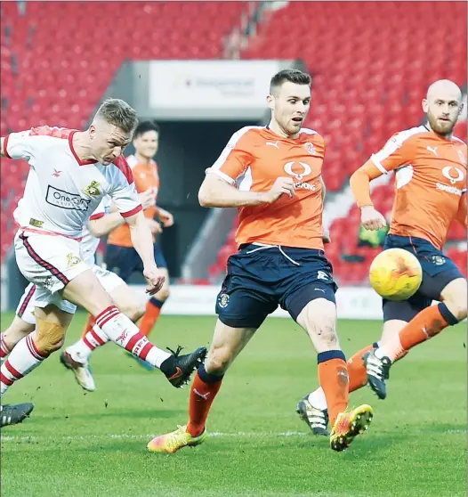  ?? PICTURES: ProSports/Ian Lyall ?? AIM, FIRE! Doncaster’s Garry McSheffrey, No.7, fires a shot at goal