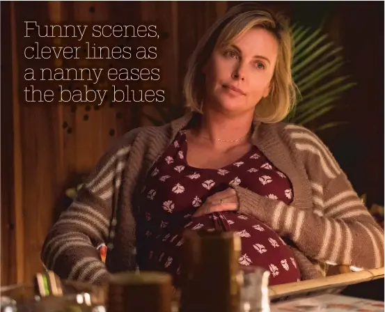  ?? | FOCUS FEATURES PHOTOS ?? “Tully” begins with harried mom Marlo ( Charlize Theron) awaiting the arrival of another child.