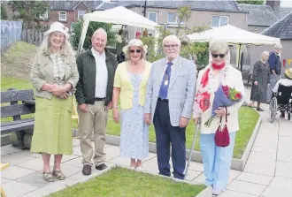  ??  ?? Opening Alyth in Bloom secretary Rosemary Langston, treasurer Hugh Skinner, chair Karin Donaldson, Provost Dennis Melloy and wife Libby Melloy