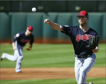  ?? ASSOCIATED PRESS FILE ?? Indians ace Corey Kluber throws a pitch during a Feb. 18 in Goodyear, Ariz.