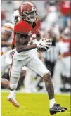  ?? Mickey Welsh The Associated Press ?? Alabama and WR Devonta Smith reached the SEC championsh­ip game, one of several title games for major conference­s in the pandemicsh­ortened season.