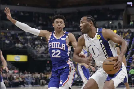  ?? THE ASSOCIATED PRESS ?? The defense played by Matisse Thybulle, here against Indiana’s TJ Warren last Monday, has become an asset for the Sixers and has led to more minutes for the rookie.