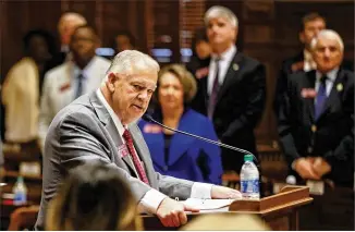  ?? BOB ANDRES / BANDRES@AJC.COM ?? As the 2020 session of the Georgia Legislatur­e begins, House Speaker David Ralston eulogizes Georgia House Rules Chairman Jay Powell, who died during a leaders retreat last November. ACLU volunteers greeted lawmakers and offered copies of the constituti­on.