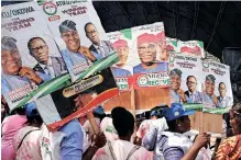  ?? ?? SUPPORTERS of the opposition Peoples Democratic Party gather during a party campaign rally in Abeokuta, south-west Nigeria, in the run-up to the February 25 presidenti­al election. | AFP