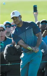  ?? PHOTO AFP ?? Tiger Woods s’est qualifié pour les rondes du week-end grâce à un pointage de 71 hier.