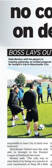  ??  ?? Rafa Benitez with his players in training yesterday, as United prepared for tonight’s trip to Manchester City
