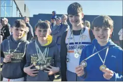  ?? ?? U16 Donnacha Geary, U14 Fionn Hayes, U15 Daniel Dorgan and U16 Calum Geary with their medals.