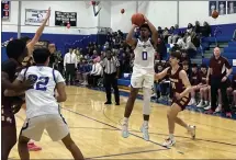  ?? SENTINEL & > ENTERPRISE / NICK MALLARD ?? Leominster’s Terrance Mccormack III puts up a shot during Friday’s win over Algonquin Regional.