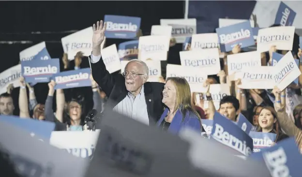  ?? PICTURE: DREW ANGERER/GETTY ?? 0 Bernie Sanders and his wife Jane show their delight as he scored a commanding victory in the race to become the party nominee