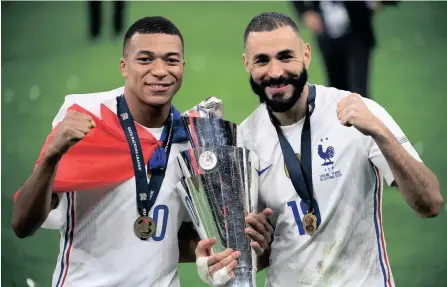  ?? ?? FRANCE’S fearsome forwards Kylian Mbappe and Karim Benzema will look to help their country defend the World Cup in Qatar. Picture: FRANCK FIFE/AFP