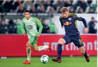  ?? AFP ?? Leipzig’s Werner vies for the ball with Wolfsburg’s William. —