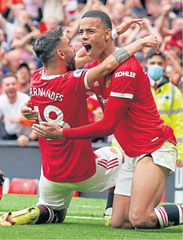  ??  ?? Manchester United’s Bruno Fernandes and Mason Greenwood celebrate