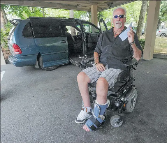  ?? JASON PAYNE/PNG ?? Byron Tracey, who recently received a parking ticket while using a disabled parking spot at G.F. Strong Rehabilita­tion Centre, says the new parking fee is ‘just a money grab.’ Authoritie­s offered to waive his ticket, but won’t change the policy, they...