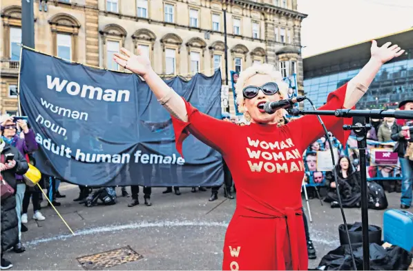  ?? ?? Anti-transgende­r activist Kellie-jay Keen-minshull, known as podcaster Posie Parker, addressed the Let Women Speak rally in Glasgow where she was met with resistance from group Cabaret Against Hate Speech