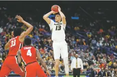  ??  ?? Missouri’s Michael Porter Jr. shoots during a March 8 game at the Southeaste­rn Conference tournament in St. Louis. Porter was considered by many as last year’s top recruit with his scoring, playmaking ability and athleticis­m. Porter and Marvin Bagley III will likely be the first forwards to hear their names called during Thursday’s NBA Draft.