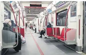  ?? RENÉ JOHNSTON TORONTO STAR ?? A largely uncrowded subway train during Friday rush hour is the norm in Toronto these days. The TTC’s ridership is down 85 per cent and that is not likely to change much anytime soon.