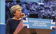  ?? RUI VIEIRA / ASSOCIATED PRESS ?? Conservati­ve Party Leader and Prime Minister Theresa May coughs during her address to delegates at the Conservati­ve Party Conference in Manchester, England, Wednesday.