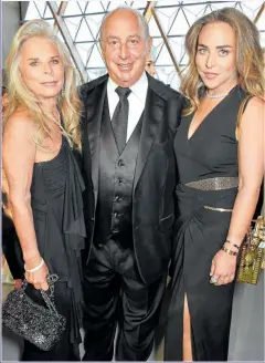  ??  ?? WEALTHY: Sir Philip, wife Tina, left, and daughter Chloe