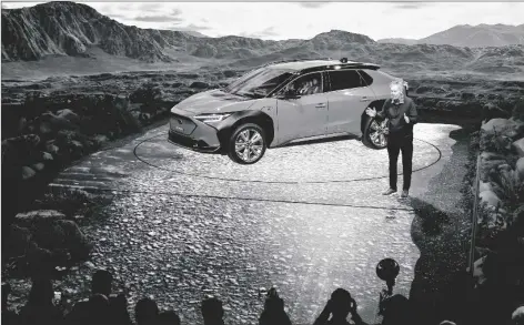  ?? AP PHOTO/MARCIO JOSE SANCHEZ ?? Tom Doll, President and CEO of Subaru of America, Inc. introduces the 2023 Subaru Solterra EV at the AutoMobili­ty LA auto show on Wednesday in Los Angeles.