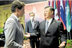  ?? —REUTERS ?? STRAINED Canadian Prime Minister Justin Trudeau (left) speaks with Chinese President Xi Jinping at the G-20 summit in Bali, Indonesia, on Nov. 16. A video of the two leaders showed Xi appearing to upraid Trudeau over their “leaked” talks.