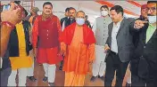  ?? HT PHOTO ?? Chief minister Yogi Adityanath inspecting the venue in Karakhiyao­n of Varanasi on Monday, ahead of PM Narendra Modi’s visit. The programme is scheduled to be held in Varanasi on December 23.