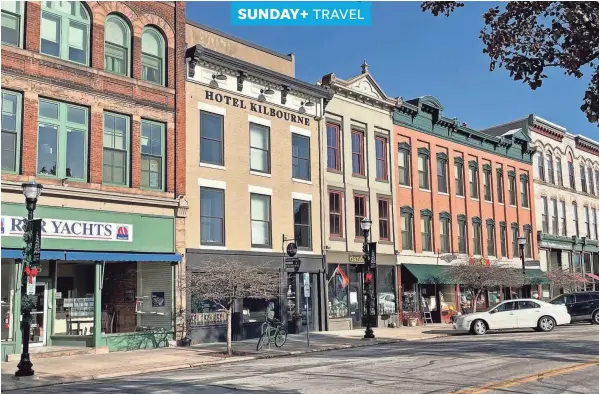  ?? COLUMBUS DISPATCH STEVE STEPHENS PHOTOS/SPECIAL TO ?? The historic storefront­s along Water Street house a variety of interestin­g shops, restaurant­s and the boutique Hotel Kilbourne.