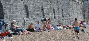  ?? PA ?? Wall-to-wall visitors: Crowds at Hot Walls Beach in Old Portsmouth, Hampshire