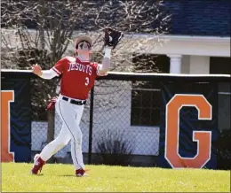  ?? Pete Paguaga / Hearst Connecticu­t ?? Fairfield Prep's Brayden Mazzoni catches a flyball against Ridgefield at Govenor Field in Ridgefield on Saturday.