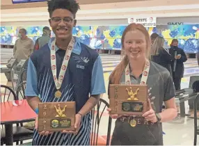  ?? JOE SPEARS/THE TENNESSEEA­N ?? Hardin Valley’s Devean Littlejohn, left, and Hardin County’s Kailee Channell and were named state champions on Wednesday.